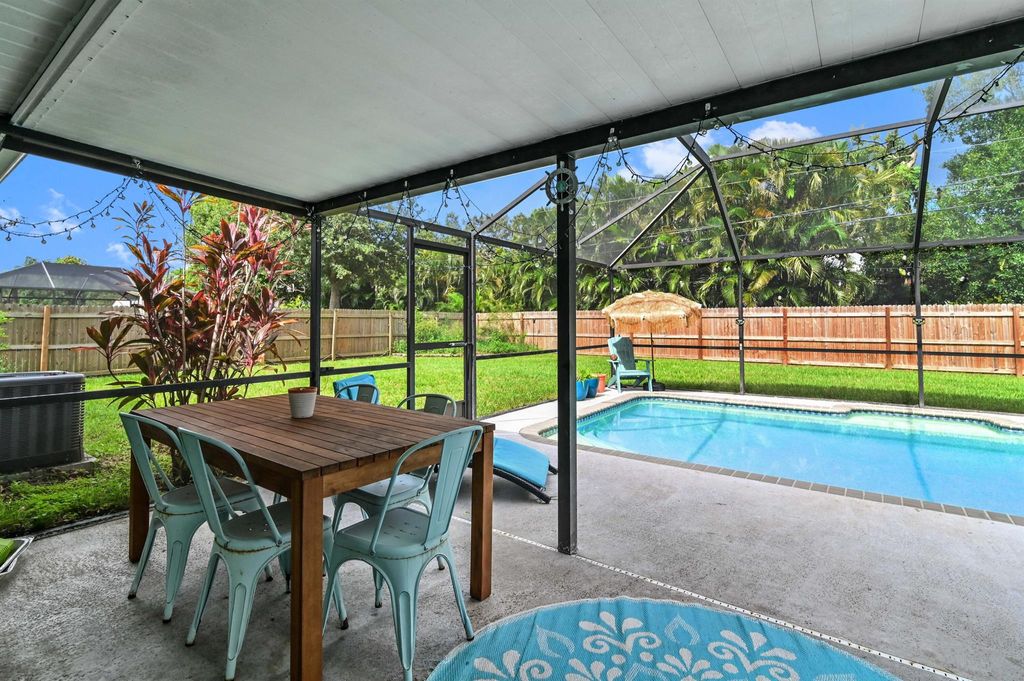 Photo of 1938 SW Capeador Street, Port Saint Lucie, FL 34953 (MLS # R10999904)