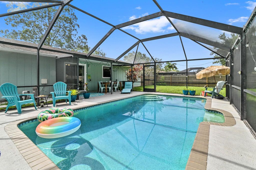 Photo of 1938 SW Capeador Street, Port Saint Lucie, FL 34953 (MLS # R10999904)