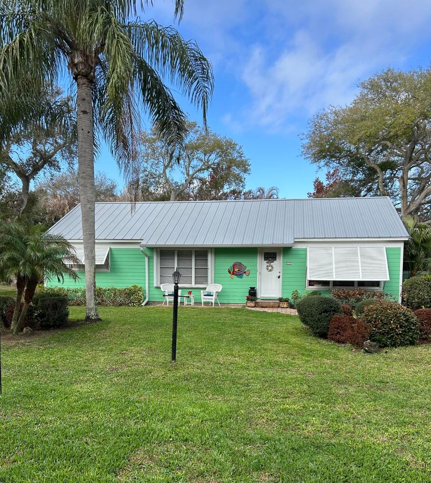 Beach cottage on large lot 2 blocks to beach 3/2 split bedrooms, open kitchen, shaker cabinets,  with bead board ceiling open to all hardwood floor family room, separate living room, off kitchen is all wood  and window room with high beamed ceiling  could be office, exercise, or extra family space. 16x 32 newly resurfaced pool, 12x14 laundry room for a casita, craft, or extra storage. In between house and laundry is 9x 23 Trex composite deck for plants and barbecue . Large open deck around pool to add hot tub, outside shower.  Crawl space, attic, fenced yard,  separate tool shed, impact windows, metal roof, newer plumbing and interior paint. Single car garage, double paver driveway for boat or RV Could be great AirB&B NO HOA, No Flood ins