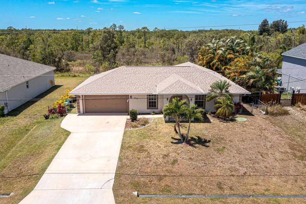 Photo of 3012 SE Wake Road, Port Saint Lucie, FL 34984 (MLS # R10980491)
