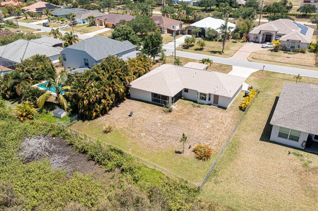 Photo of 3012 SE Wake Road, Port Saint Lucie, FL 34984 (MLS # R10980491)