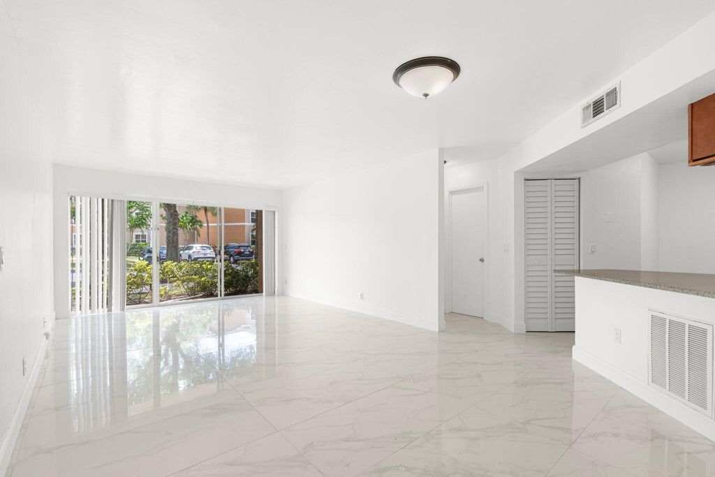 Photo of 9055 Wiles Road #105, Coral Springs, FL 33067 (MLS # R11100405)