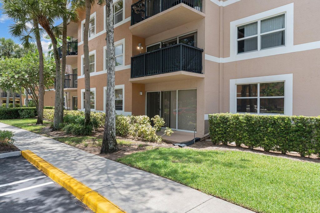 Photo of 9055 Wiles Road #105, Coral Springs, FL 33067 (MLS # R11100405)
