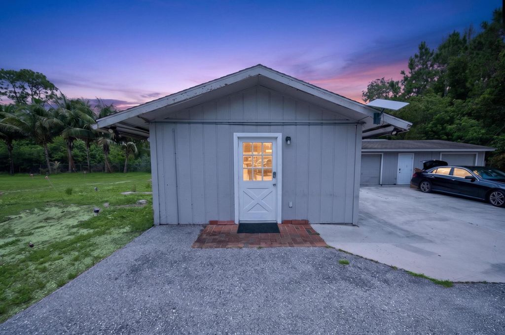 Photo of 10754 Tamis Trail #Unit A, Wellington, FL 33449 (MLS # B26027721)