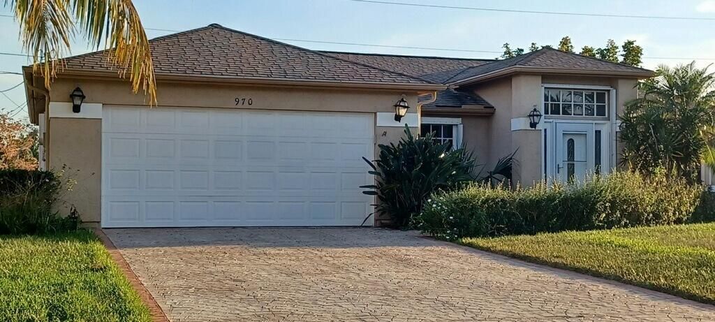Photo of 970 SW Cornelia Avenue, Port Saint Lucie, FL 34952 (MLS # R11025588)
