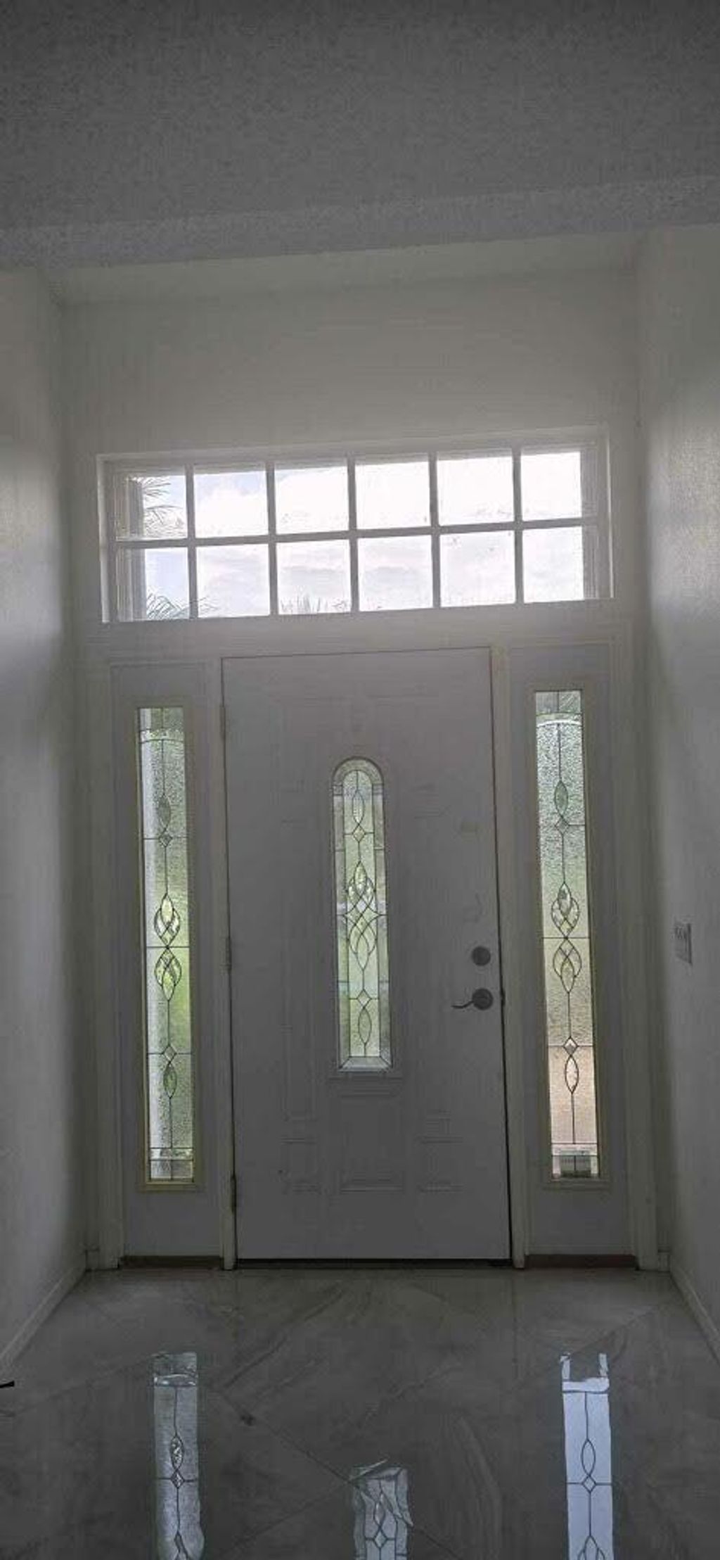 Photo of 970 SW Cornelia Avenue, Port Saint Lucie, FL 34952 (MLS # R11025588)