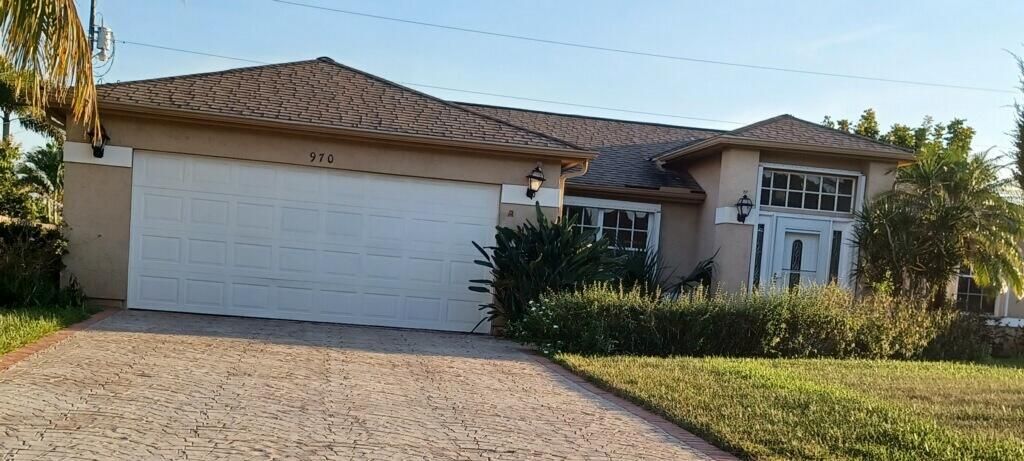 Photo of 970 SW Cornelia Avenue, Port Saint Lucie, FL 34952 (MLS # R11025588)