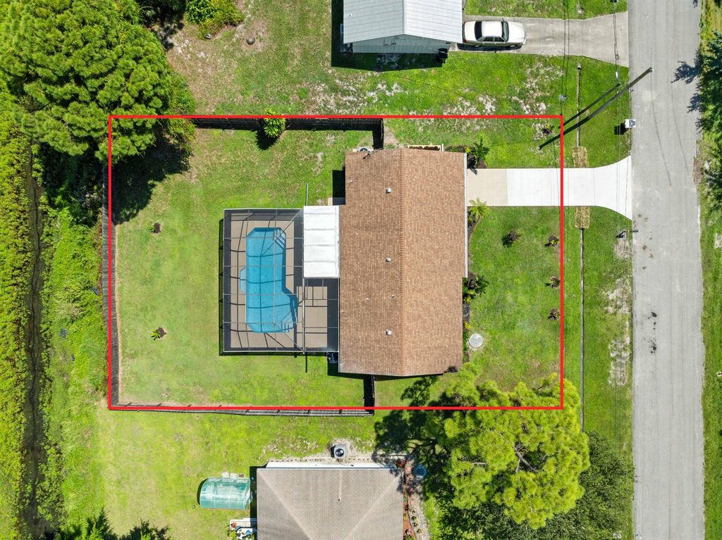 Photo of 213 SW Chapman Avenue, Port Saint Lucie, FL 34984 (MLS # R11124835)