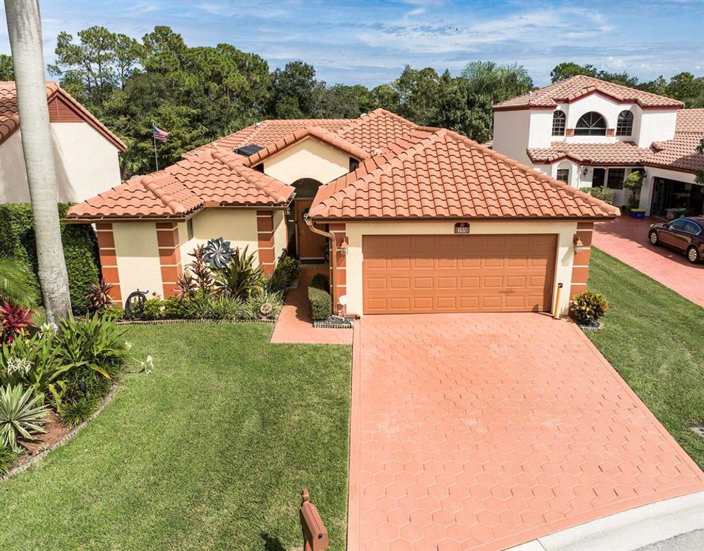 Photo of 155 Island Way, Greenacres, FL 33413 (MLS # R10754613)