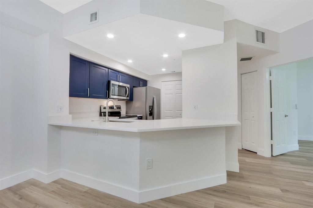 Photo of 3023 Alcazar Place #203, Palm Beach Gardens, FL 33410 (MLS # R10888285)