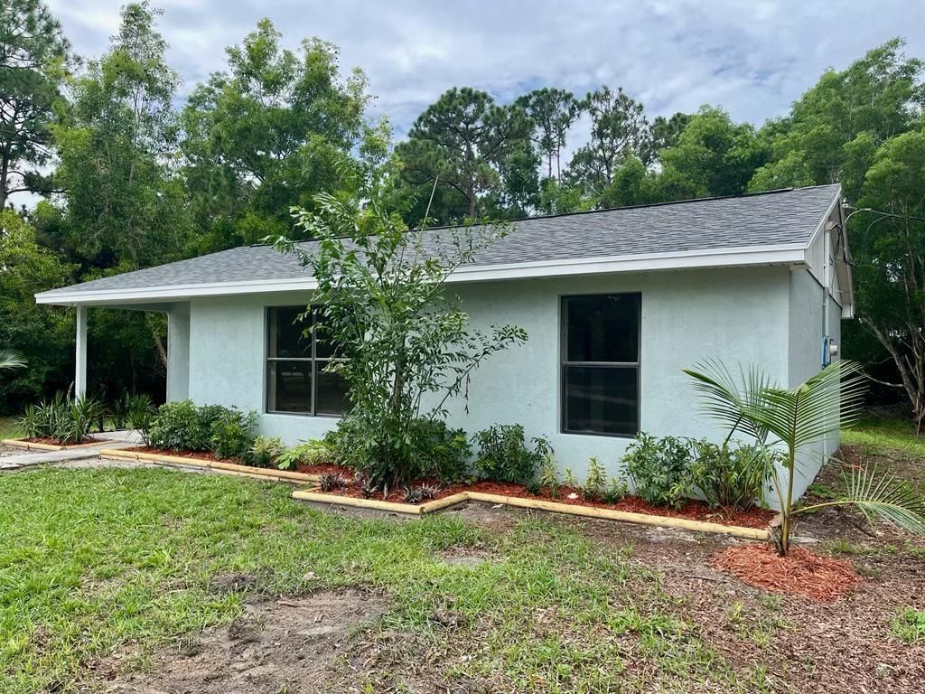 Photo of 14788 76th Road N, Loxahatchee, FL 33470 (MLS # R11003851)