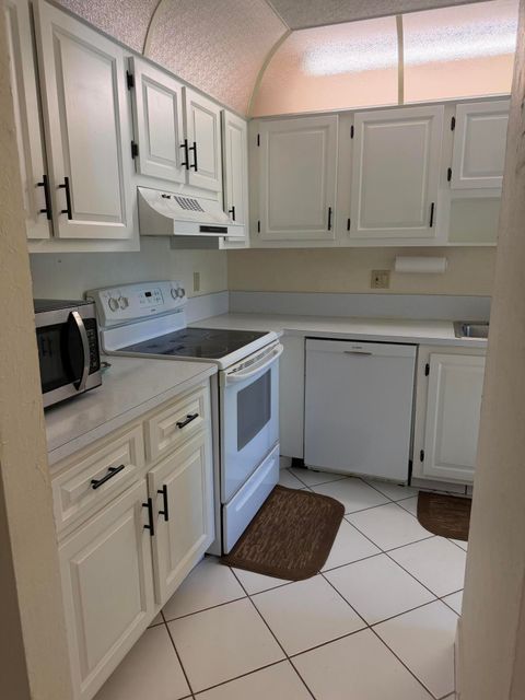 Tiny photo for 1360 NW 19th Terrace #101, Delray Beach, FL 33445 (MLS # B26032108)