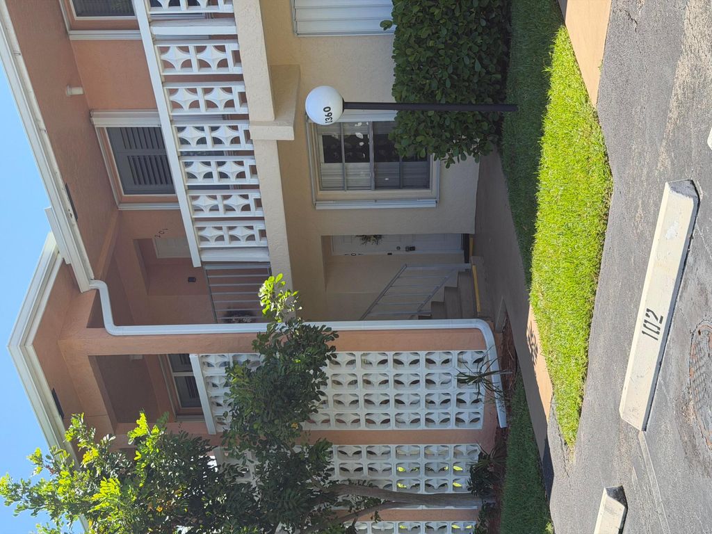 Photo of 1360 NW 19th Terrace #101, Delray Beach, FL 33445 (MLS # B26032108)