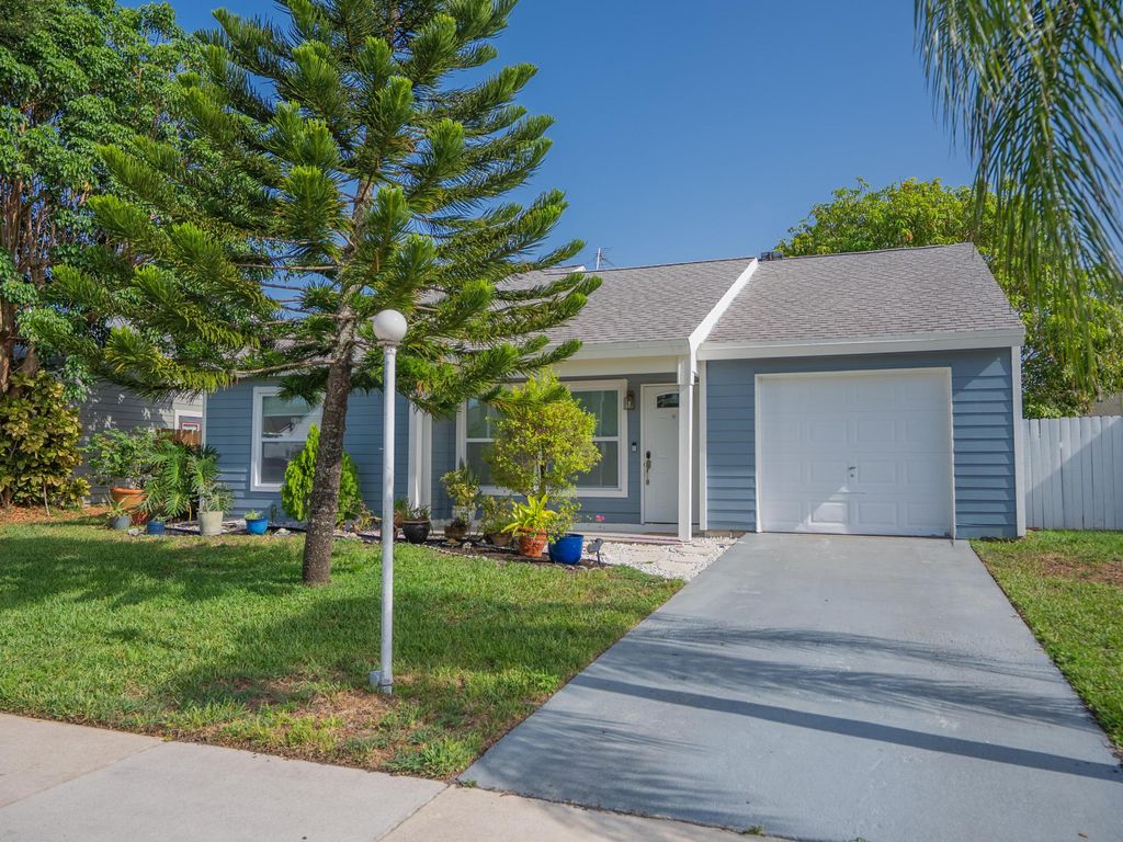 Photo of 7771 Blairwood Circle N, Lake Worth, FL 33467 (MLS # R11103923)