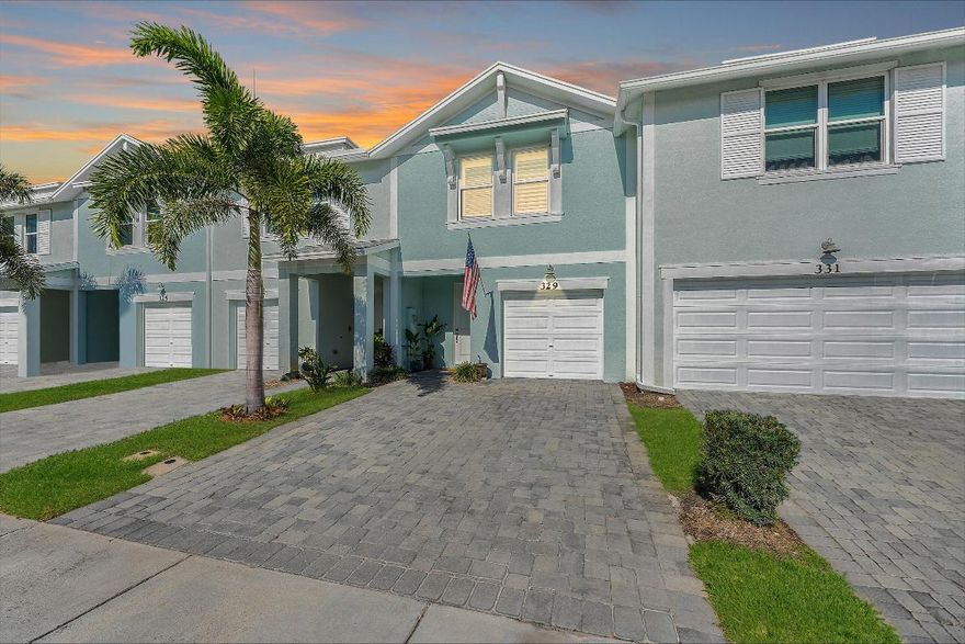 Refined waterfront living in this nearly new townhome set within a boutique Stuart enclave. Ideally positioned, you're just moments from Downtown Stuart's dining, shopping, marina, and riverfront charm, with effortless access to I-95 and the Turnpike. Built in 2021, this three-bedroom, two-and-a-half-bath residence with garage blends durability and efficiency with concrete construction, impact glass, and energy-saving insulation. Interiors showcase crisp modern finishes, stone surfaces, and serene water vistas from both sides of the home. Enhancements include an expanded driveway and outdoor entertaining space, shower details, and lighting. Impeccably maintained and move-in ready, this is a polished retreat offering style, comfort, and a prime Stuart location.