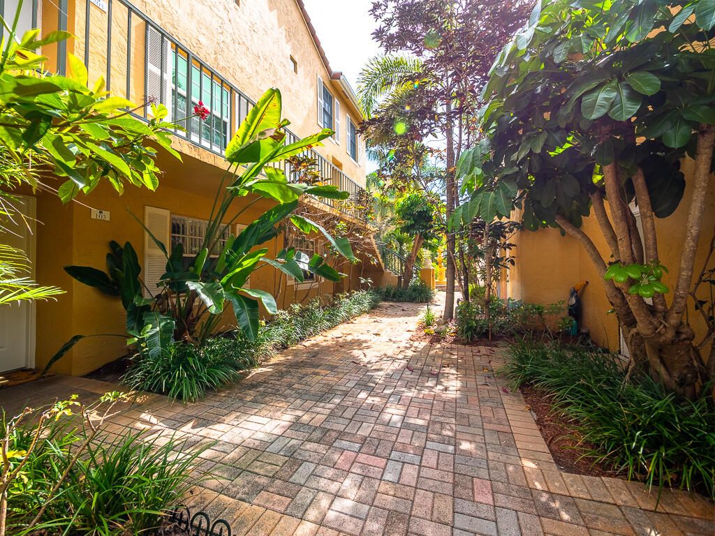 Photo of 1020 Lake Shore Drive #202, Lake Park, FL 33403 (MLS # R11161507)