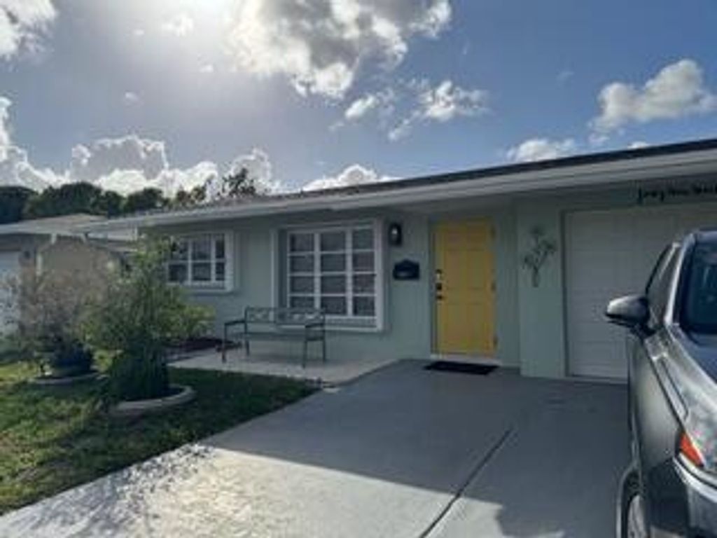 Photo of 4919 NW 47th Terrace, Tamarac, FL 33319 (MLS # B26014298)