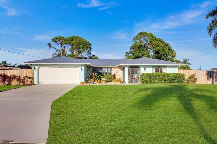 SANDPIPER LOCATION! Check this stunning move in ready CBS 3/2/2 located in one of Port Saint Lucie's most desirable neighborhoods of Sandpiper. Oversized corner lot close to Saints Golf Course, major shopping, mall, beaches and so much more. Fully renovated and meticulously maintained home. Metal roof & seamless gutters less than a year old. All new insulation & duct work. Tongue & Groove ceilings, brand new stainless steel appliances, new flooring, fully renovated master bedroom & bath, new pool pump, new water heater, new fence, new solid core interior doors, custom barn pantry door, freshly painted inside & out, new light fixtures, travertine in front porch & massive beautiful patio & backyard with pool for all your entertaining needs. AC 2014. Schedule your private showing today!