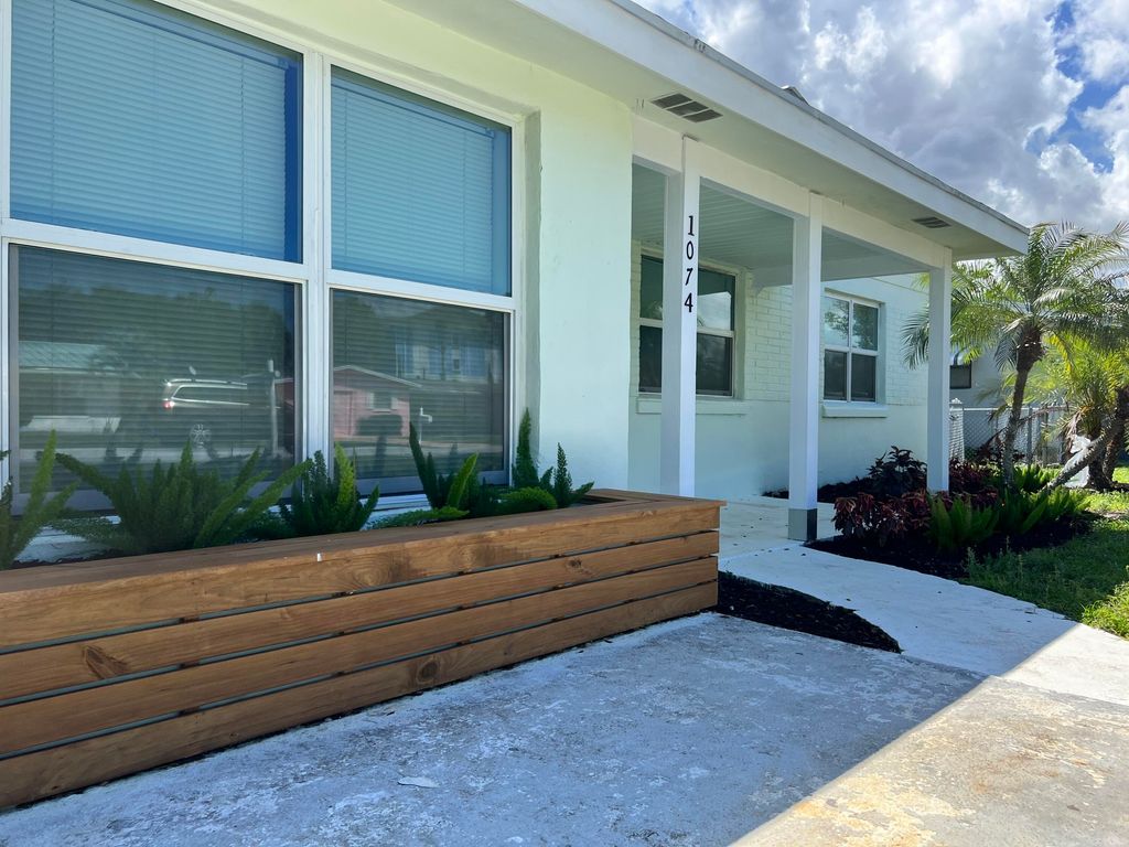 Photo of 1074 NW 16th Place, Stuart, FL 34994 (MLS # R10784985)