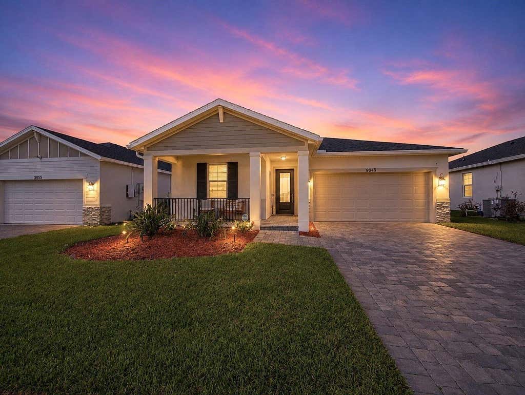 Photo of 9049 Dahlia Circle, Port Saint Lucie, FL 34986 (MLS # B26057792)