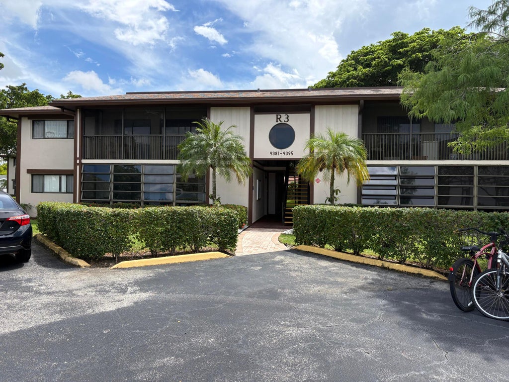 Photo of 9391 S Belfort Circle #211, Tamarac, FL 33321 (MLS # B26070599)