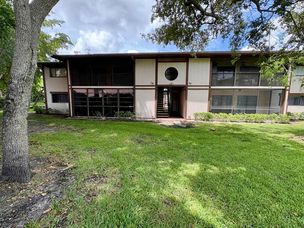 Photo of 9391 S Belfort Circle #211, Tamarac, FL 33321 (MLS # B26070599)