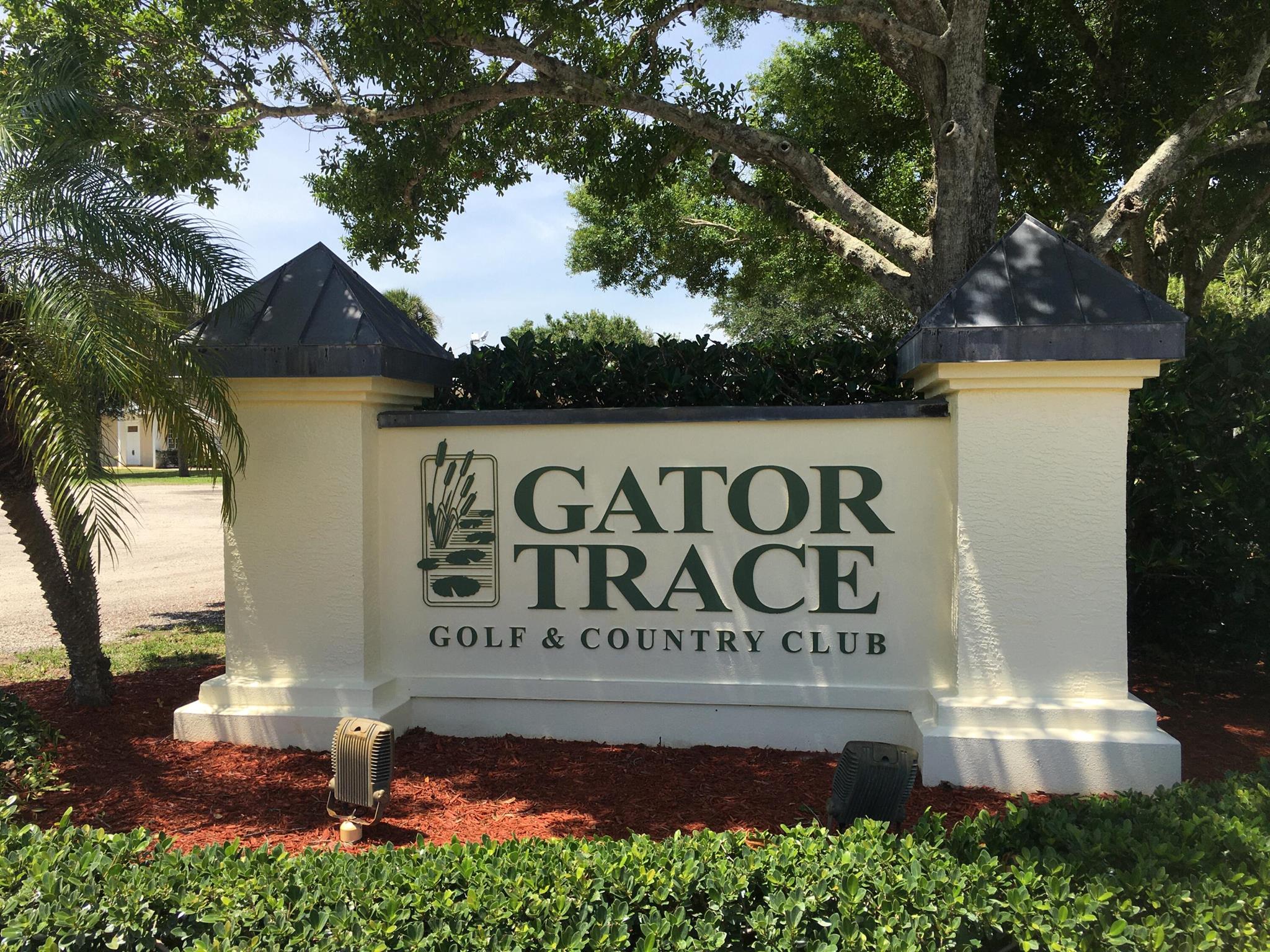 IMPACT FEES ALREADY PAID ! The lot has been filled and ready for construction; no waiting! Blue prints available or create your own custom dream home on the last available lot in this fabulous community. The water meter has been installed and the sewer line is ready for hook up. This is a semi-private club with a par 70 golf course with memberships available but not mandatory. The clubhouse is open to the public. Join in the fun at the restaurant/ bar, or lounge and swim at Olympic size swimming pool ! Membership information can be found at Gator Trace Country Club's website. Located east of US 1, the location puts you 15 minutes from downtown Jensen Beach or Ft. Pierce and another ten minutes more to the marvelous Treasure Coast beaches. Enjoy the fun at Gator Trace !