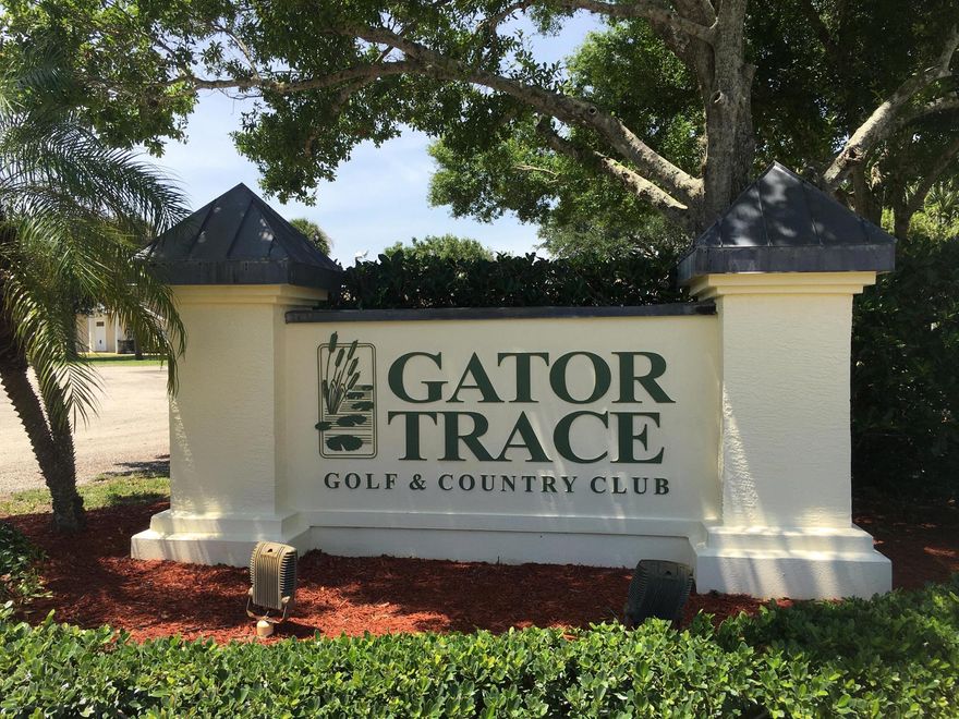 IMPACT FEES ALREADY PAID !  LOW HOA FEES . The lot has been filled and ready for construction; no waiting! Blue prints available or create your own custom dream home on the last available lot in this fabulous community. The water meter has been installed and the sewer line is ready for hook up.  This is a semi-private club with a par 70 golf course with memberships available but not mandatory.  The clubhouse is open to the public.  Join in the fun at the restaurant/ bar,  or lounge and swim at Olympic size swimming pool ! Membership information found at Gator Trace Country Club's website.  Located east of US 1, the location puts you  15 minutes from downtown Jensen Beach or Ft. Pierce and another ten minutes more to the marvelous Treasure Coast beaches. Enjoy the fun at Gator Trace !