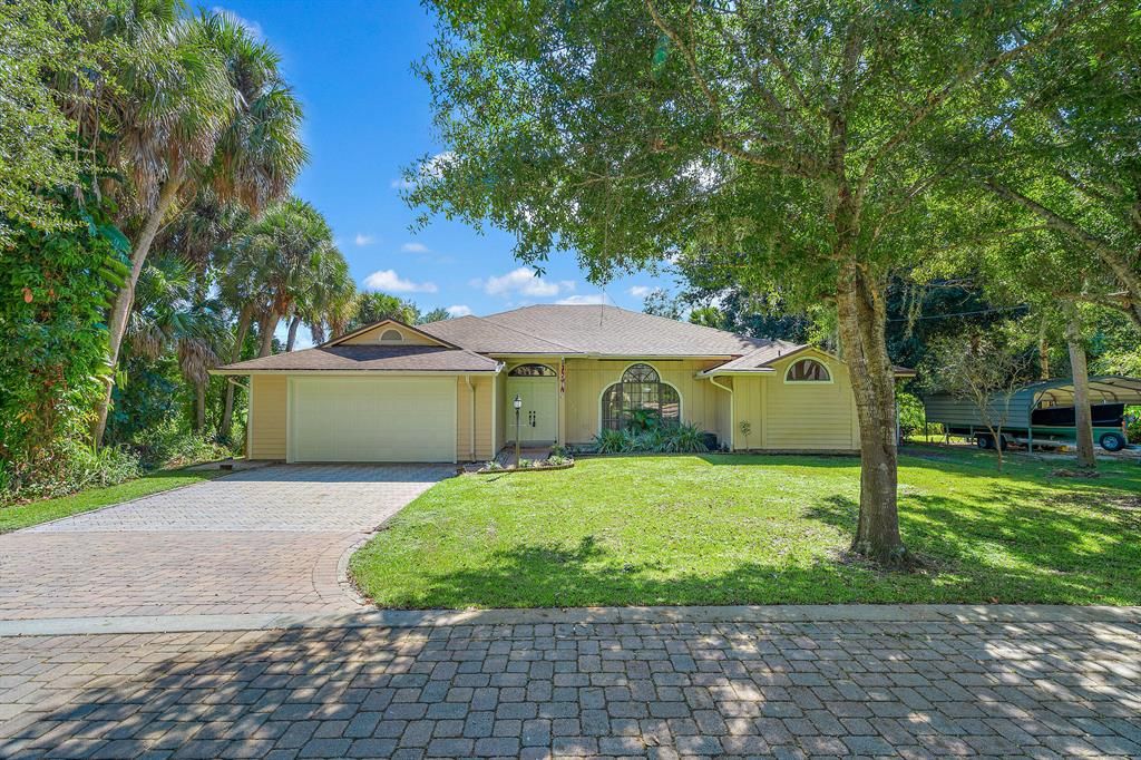 Photo of 522 SW Timber Trail, Stuart, FL 34997 (MLS # R10754787)