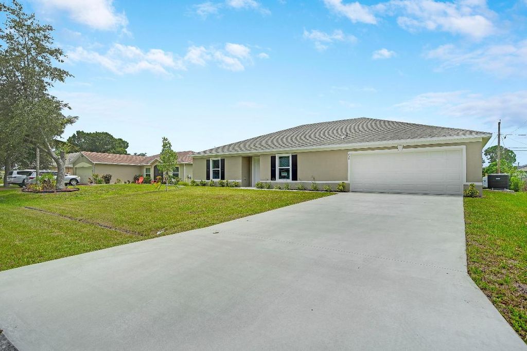 Photo of 438 SW Meadow Terrace, Port Saint Lucie, FL 34953 (MLS # R11119496)