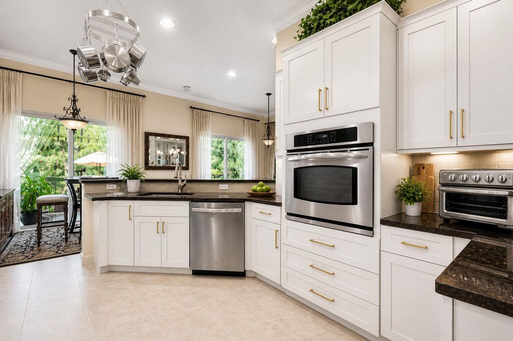 Photo of 974 Mill Creek Drive, Palm Beach Gardens, FL 33410 (MLS # B26020656)
