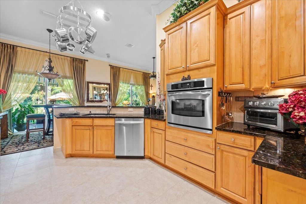 Photo of 974 Mill Creek Drive, Palm Beach Gardens, FL 33410 (MLS # B26020656)