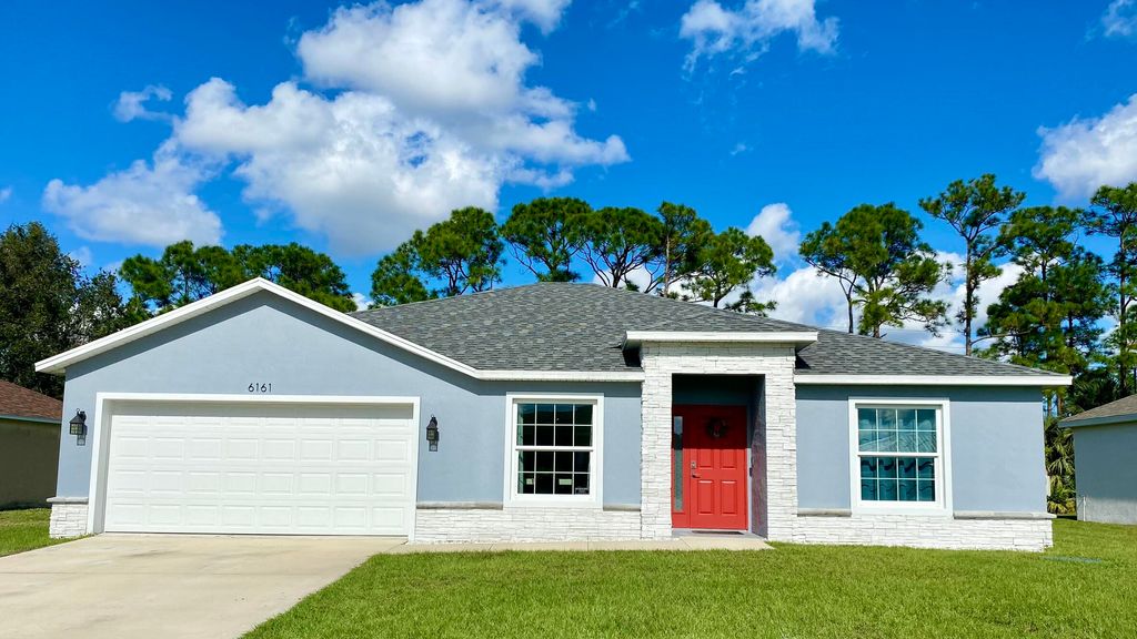 Photo of 6161 NW Gatun Drive, Port Saint Lucie, FL 34986 (MLS # R10939764)