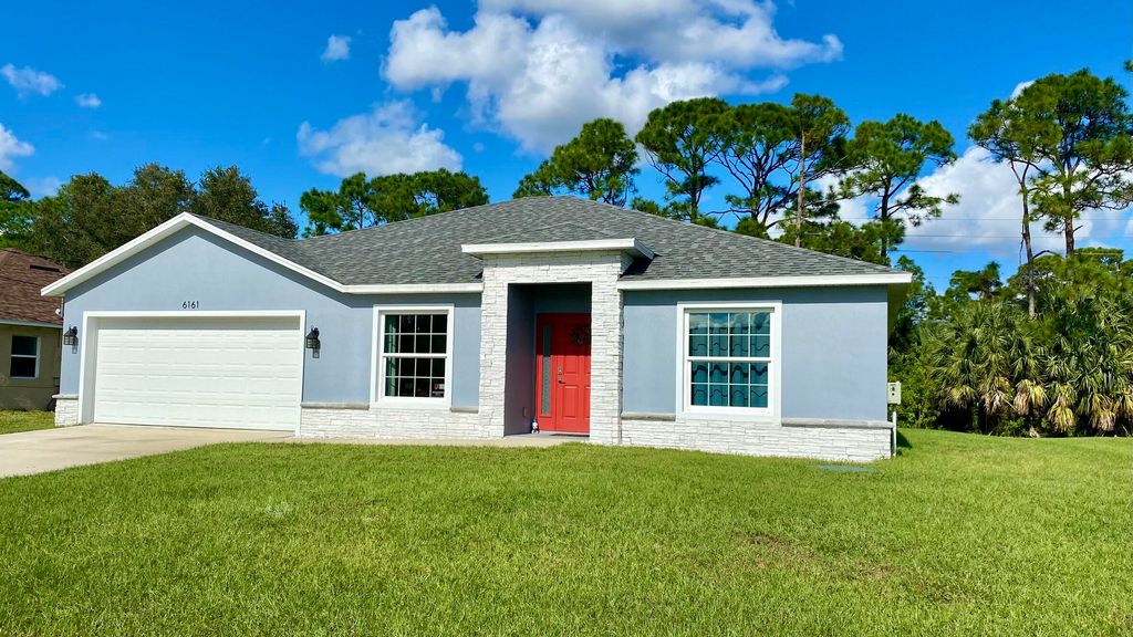 Photo of 6161 NW Gatun Drive, Port Saint Lucie, FL 34986 (MLS # R10939764)