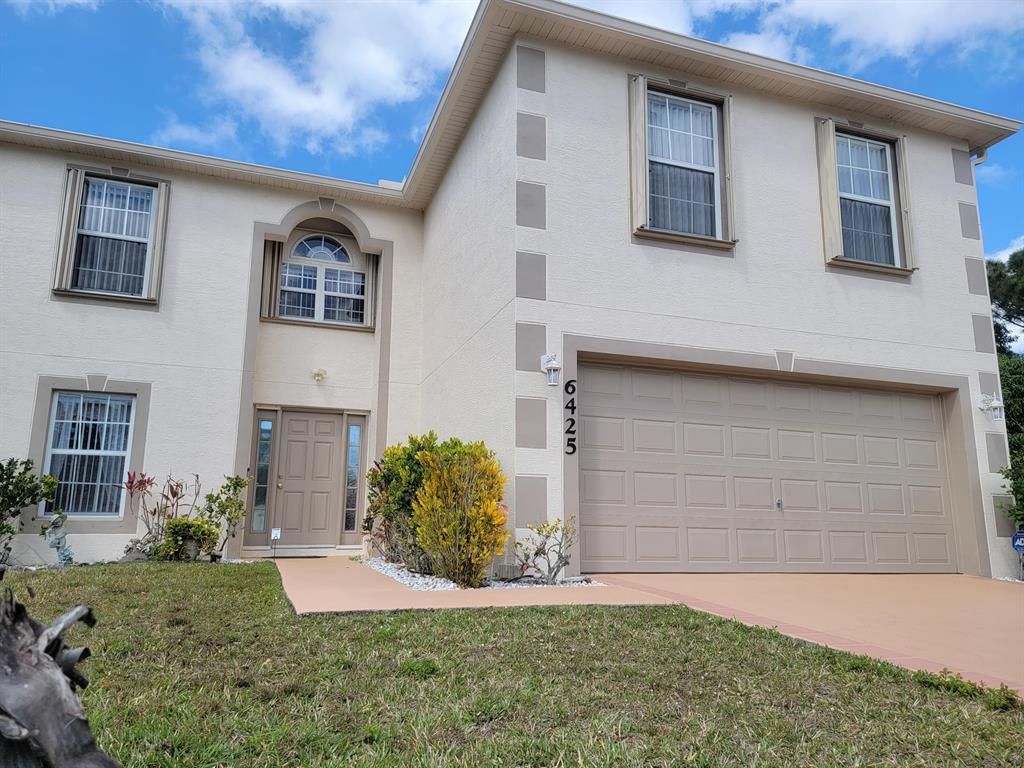 Photo of 6425 NW Friendly Circle, Port Saint Lucie, FL 34983 (MLS # R10780045)