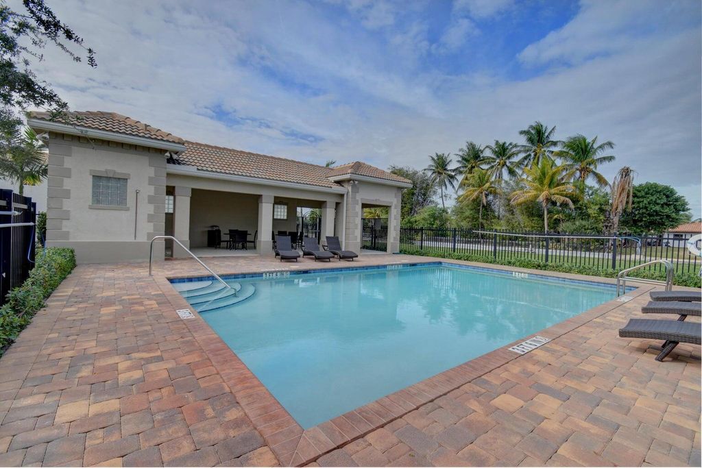 Photo of 1160 Sepia Lane, Lake Worth Beach, FL 33461 (MLS # R10988162)