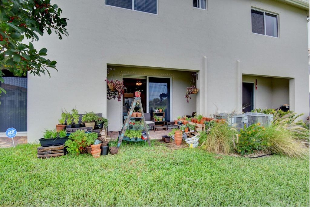 Photo of 1160 Sepia Lane, Lake Worth Beach, FL 33461 (MLS # R10988162)