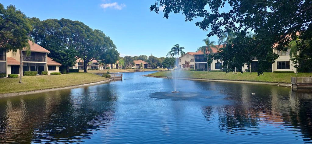 Photo of 5521 Coach House Circle #D, Boca Raton, FL 33486 (MLS # R11164197)