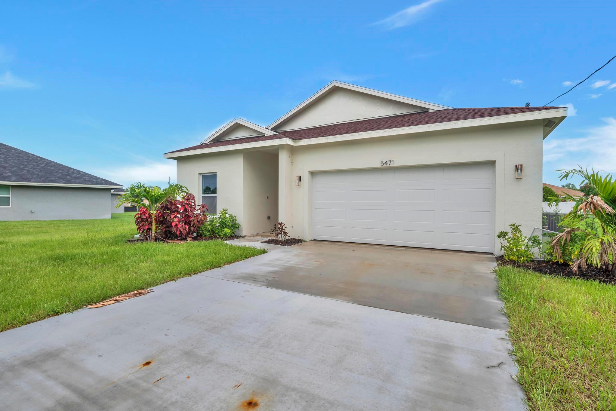 Stunning New Construction Home on Oversized Cul-de-Sac Lot! Welcome to this beautifully built 3-bedroom, 2-bathroom home located in the heart of Port St. Lucie, FL. Situated on a large, oversized lot at the end of a quiet cul-de-sac, this property offers both privacy and space to enjoy. Step inside to find a bright, open-concept floor plan featuring luxury vinyl plank (LVP) flooring throughout and a modern kitchen with white shaker cabinets, sleek quartz countertops, and stainless steel appliances. The spacious master suite includes a deluxe bathroom with high-end finishes, perfect for unwinding at the end of the day. With ample outdoor space and no HOA, this home is ideal for entertaining, storing recreational toys, or even adding a pool. Don't miss your opportunity to own this Gem!
