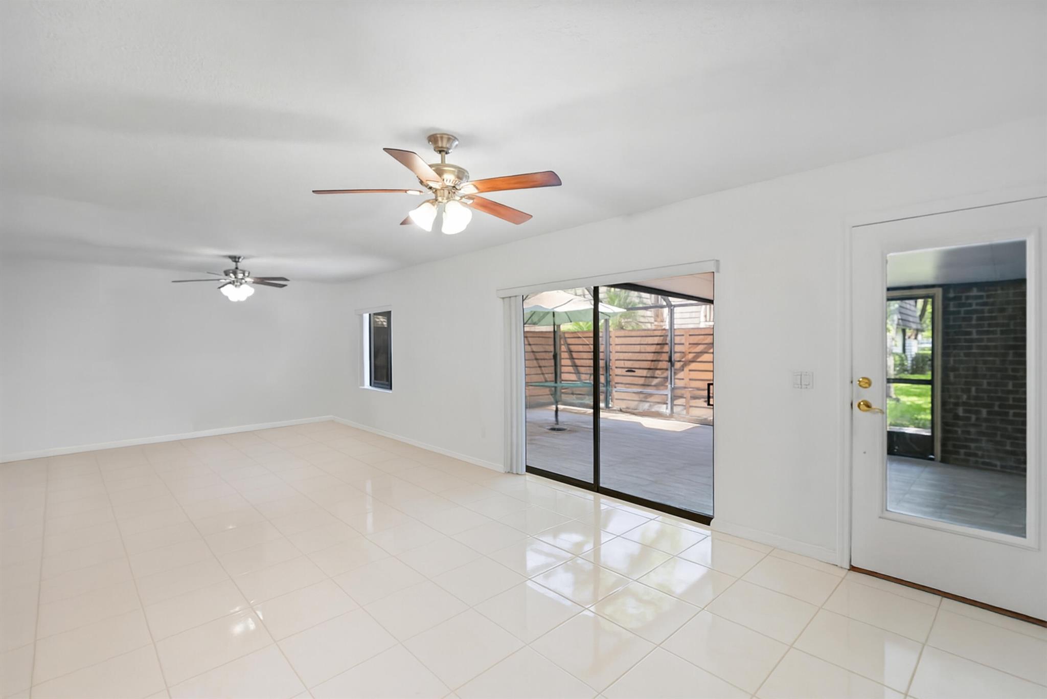 Beautifully Maintained 2-Bedroom, 2.5-Bathroom Townhouse In The Glenwood Neighborhood Of PGA National. Recent Updates Include A Brand-New Kitchen, New Flooring, in Kitchen And New Ceiling Fans (2025), Plus A Fully Redone Screened And Fenced Patio, Updated Bathrooms, And Newer Tile Floors Upstairs And Down. Additional Features Include New Siding, Fresh Interior Paint, Newer Kitchen Appliances, 2021 A/C, New Water Heater, Updated Electrical, Custom Closets, And A New Roof (2025). Glenwood Offers Tennis, Pickleball, Racquetball, A Swimming Pool, A Park, And Scenic Walking Trails Throughout The Community.