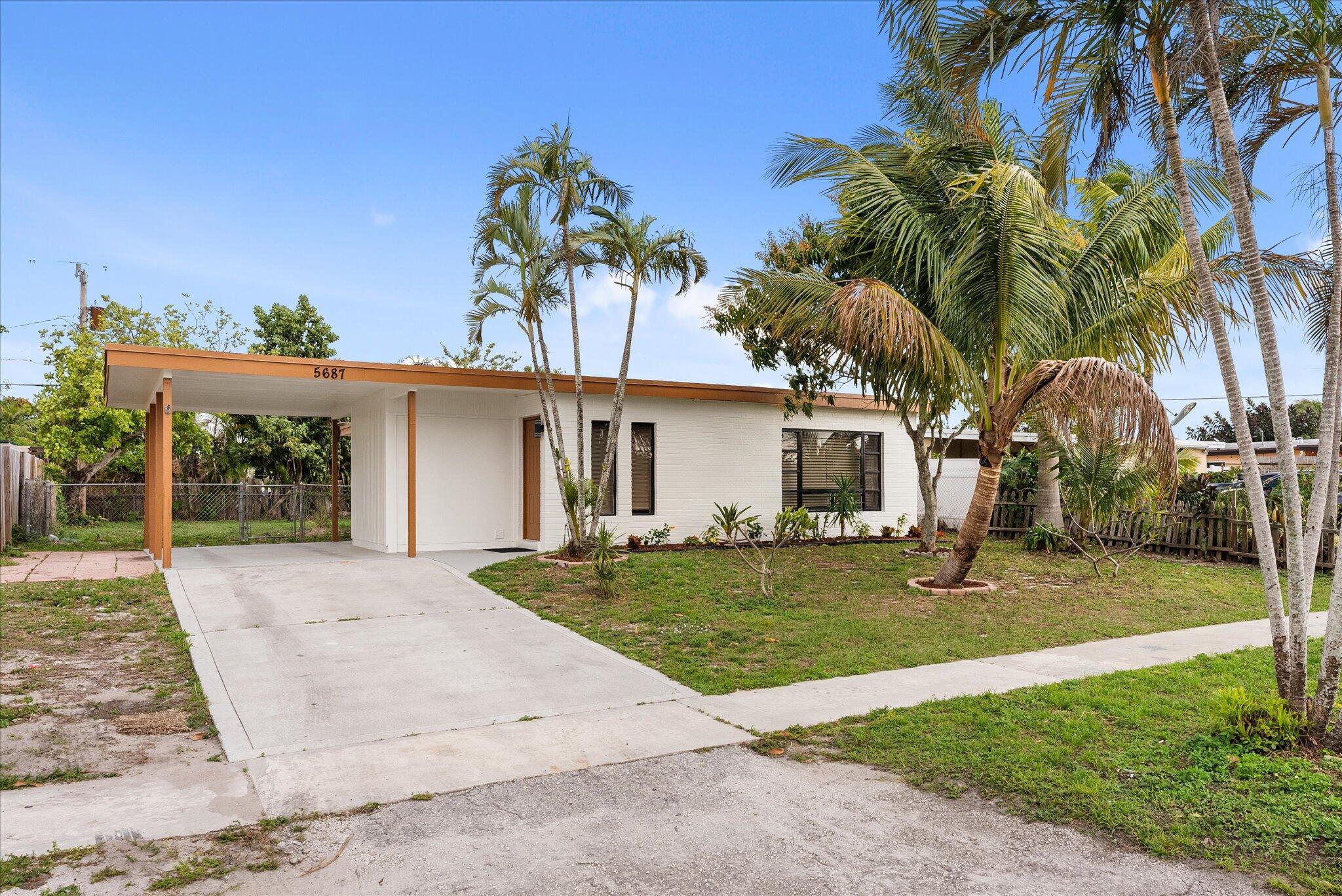 Fully remodeled and move in ready 3 bedroom, 2 bathroom, and carport single family home located in the heart of West Palm Beach, Fl, only minutes from I-95, the airport, restaurants, and shopping centers. The property features porcelain title floors, fenced in backyard, granite countertops, large driveway, washer and dryer hookup, and much more. Come see this beautiful home today!
