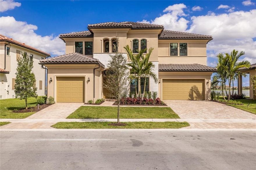 Welcome to the newest Voyager available in Parkland Bay located in one of the most desirable lots in the community.  The home features 5 bedrooms, a 3-car garage and over $400K of upgrades.  The second level flows effortlessly with 4 bedrooms and a large lot with unparalleled views of the lake.  Surrounded around a gorgeous lake, residents can enjoy resort-style living with upscale indoor-outdoor amenities, including a luxurious clubhouse, pool, sports and more.
