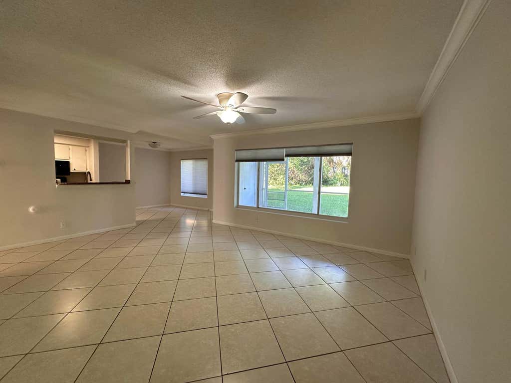 Photo of 815 W BOYNTON BEACH Boulevard #16-104, Boynton Beach, FL 33426 (MLS # B26068916)