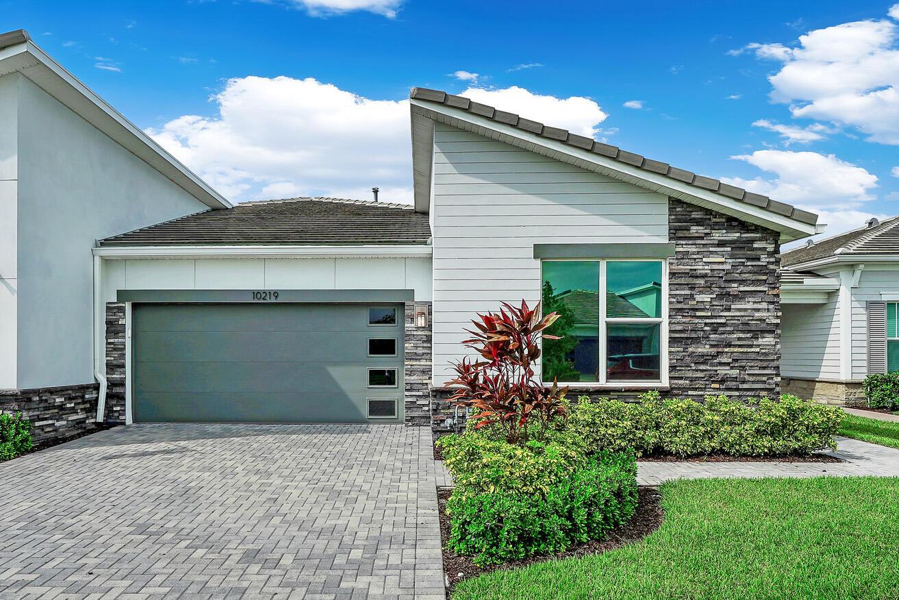 Discover Telaro; a contemporary 55+ community and this modern oasis 3-bedroom, 2.5-bath villa; the only 3-bedroom available NOW! Built in 2022, this 1,878 sqft Eden Model by Mattamy Homes lives like a sleek single-family, blending elegant craftsmanship plus thoughtful upgrades; an extended lanai with pavers & panorama screening for seamless indoor-outdoor living. A reimagined laundry room with luxury storage and passthrough access to the primary suite. Private yet with oversized windows that fill the home with light. Neutral designer tones and a floor plan that is chic, sophisticated yet comfortable with the guest wing tucked away for total separation. Outside, mature landscaping provides a private semi-fenced backyard; no ''fishbowl living'' here. This is a rare opportunity to own with