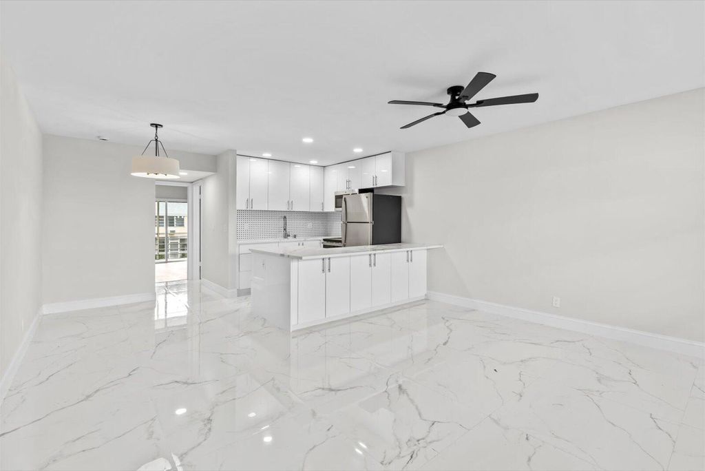 Photo of 17 Andover A, West Palm Beach, FL 33417 (MLS # R11143891)