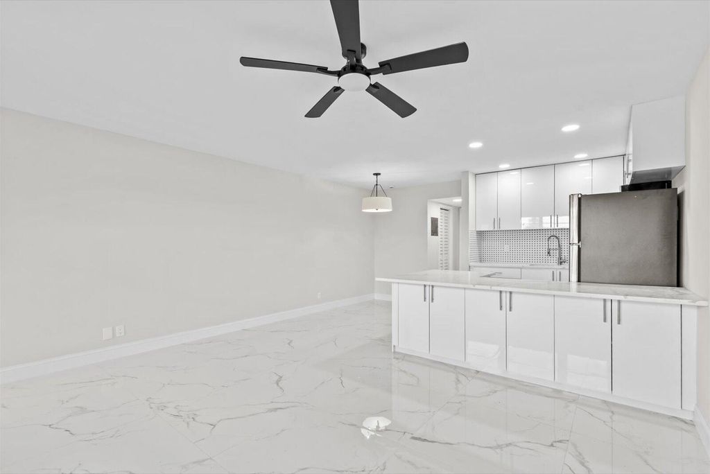 Photo of 17 Andover A, West Palm Beach, FL 33417 (MLS # R11143891)