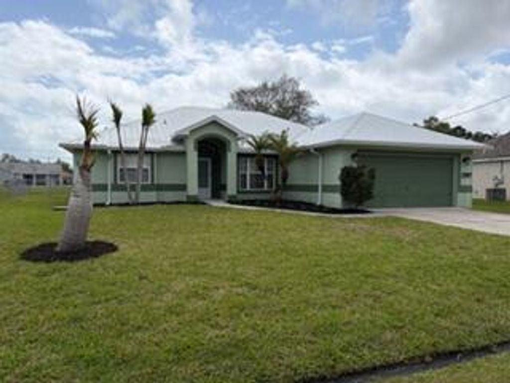 Photo of 2367 SE Rock Springs Drive, Port Saint Lucie, FL 34952 (MLS # B26003672)