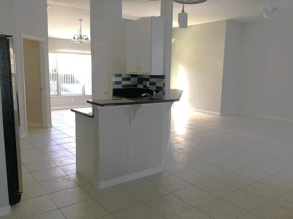 Photo of 2367 SE Rock Springs Drive, Port Saint Lucie, FL 34952 (MLS # B26003672)