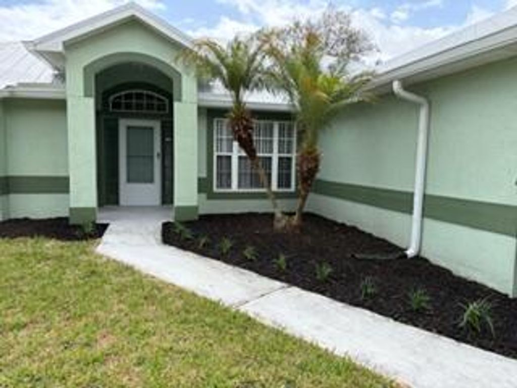 Photo of 2367 SE Rock Springs Drive, Port Saint Lucie, FL 34952 (MLS # B26003672)