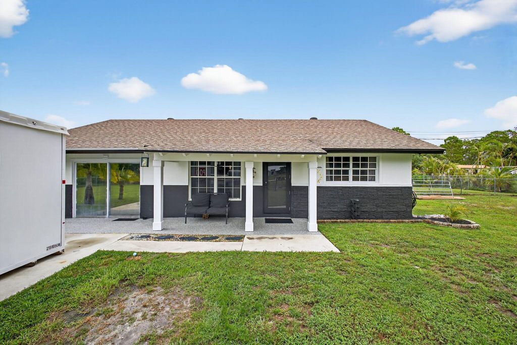 Photo of 11447 52nd Road N, The Acreage, FL 33411 (MLS # R11105075)